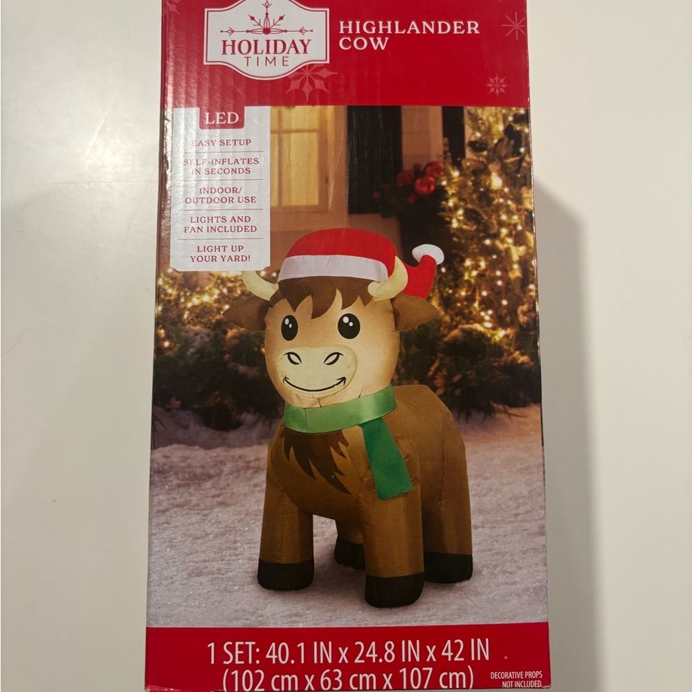 Holiday Time Highlander Cow Inflatable with Red Santa Hat